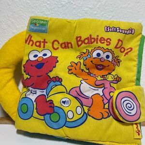 Sesame Street Yellow Plush Soft Book "What Can Babies Do?"